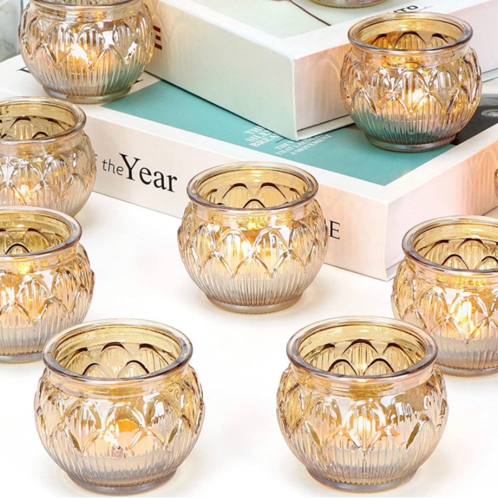 12 tea light candle holders. Used only once at my wedding. Includes LED lights